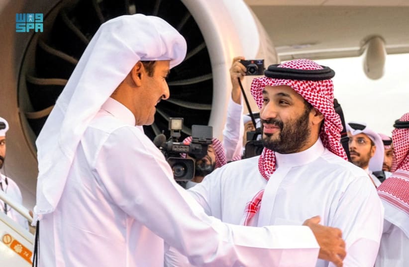  Saudi Crown Prince Mohammed bin Salman receives Qatar's Emir Sheikh Tamim bin Hamad al-Thani upon his arrival in Riyadh, Saudi Arabia, November 10, 2023.  (photo credit: SAUDI PRESS AGENCY/HANDOUT VIA REUTERS)