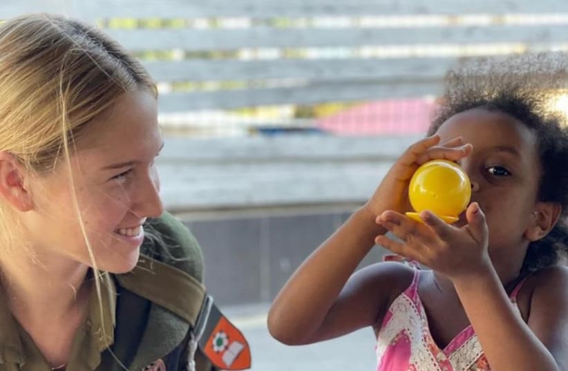  Soldiers in the Education and Youth Corps work with children displaced from their homes and communities by the October 7 massacre. (photo credit: IDF SPOKESPERSON'S UNIT)