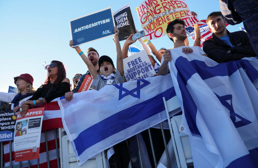  Israeli Americans and supporters of Israel gather in solidarity with Israel and protest against antisemitism, amid the ongoing conflict between Israel and the Palestinian group Hamas, during a rally on the National Mall in Washington, U.S, November 14, 2023. (photo credit: REUTERS/LEAH MILLIS)