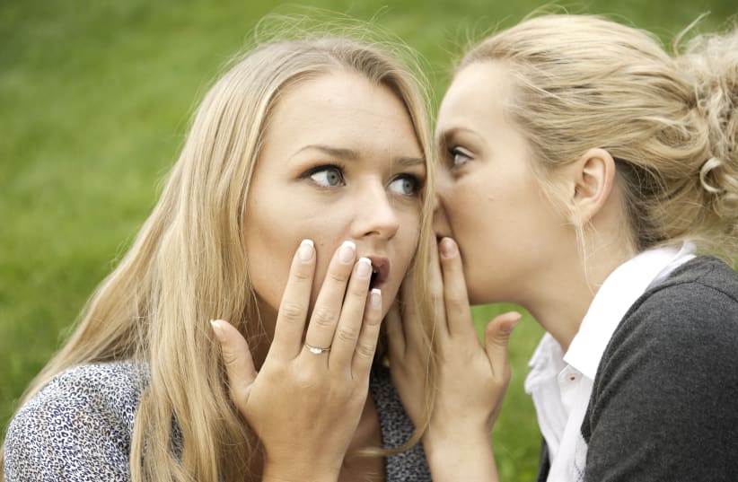  An illustrative image of two women sharing a secret. (photo credit: INGIMAGE)