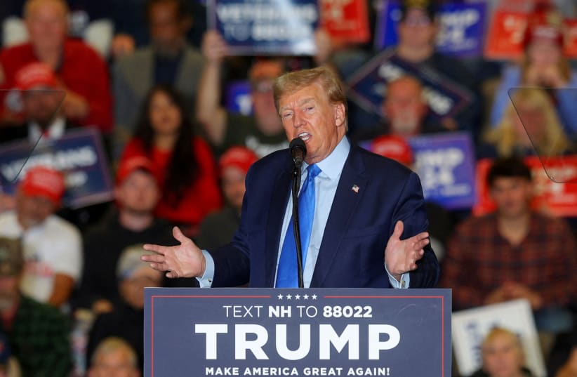  Republican presidential candidate and former U.S. President Donald Trump speaks during a campaign rally in Claremont, New Hampshire, U.S., November 11, 2023. (photo credit: REUTERS/BRIAN SNYDER)