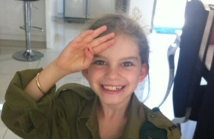  A young Madeleine Bollag dressed in a soldier's uniform (photo credit: COURTESY/MADELEINE BOLLAG)