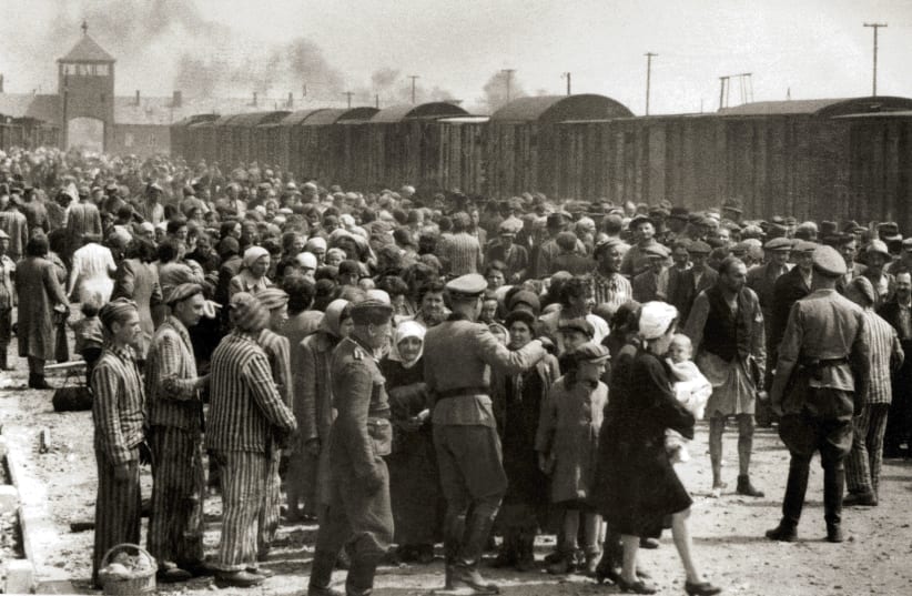  HUNGARIAN JEWS on the ‘selection’ ramp at Auschwitz II-Birkenau in occupied Poland, spring 1944. This photo is from the ‘Auschwitz Album,’ the only surviving visual evidence of the mass murder process at Auschwitz-Birkenau. (photo credit: YAD VASHEM/WIKIMEDIA COMMONS)