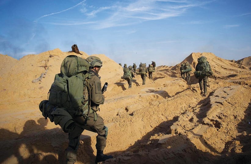  SOLDIERS TAKE PART in an operation in Gaza yesterday. (photo credit: IDF/Handout via REUTERS)