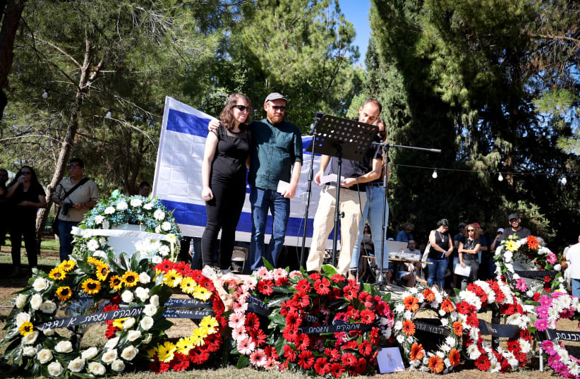  Family and friends attend the funeral of peace activist and one of the founders of the "Women Wage Peace" movemenet, Vivian Silver at Kibbutz Gezer, central Israel. November 16, 2023. (photo credit: Jonathan Shaul/Flash90)