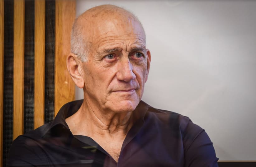  Former Israeli Prime Minister Ehud Olmert arrives for a court hearing on the lawsuit of the Netanyahu family against him, at the Tel Aviv Magistrate's Court on June 12, 2022. (photo credit: AVSHALOM SASSONI/FLASH90)