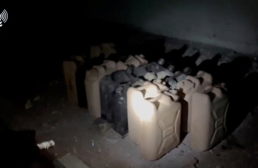  Gallon containers are lined up on the ground, as the Israeli Army says, while delivering fuel to Al Shifa hospital, in a location given as Gaza, in this screengrab taken from a handout video released on November 12, 2023. (photo credit: IDF SPOKESPERSON'S UNIT)