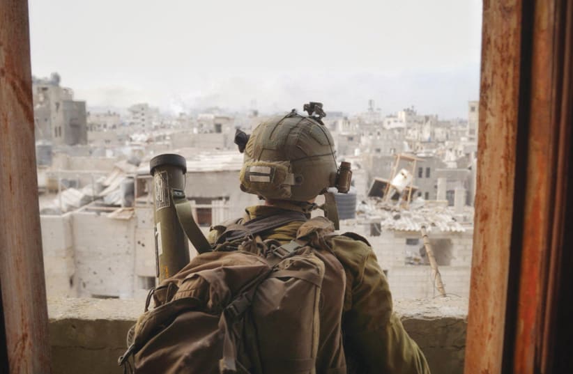  AN IDF soldier operates in the Gaza Strip last week (photo credit: IDF)