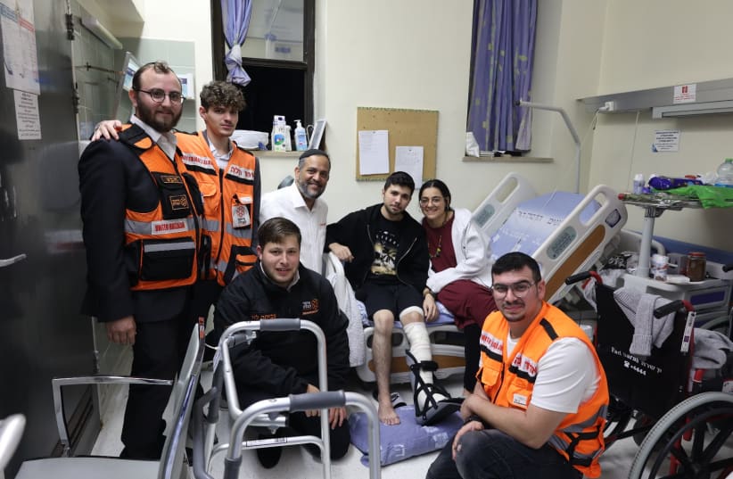  The meeting at the hospital. From left Eliezer Maklev, Avi Sheinhart, Tzvika Levy, Moshe Cohen, Itamar, Raya, Ari Gartenhouse (photo credit: UNITED HATZALAH‏)