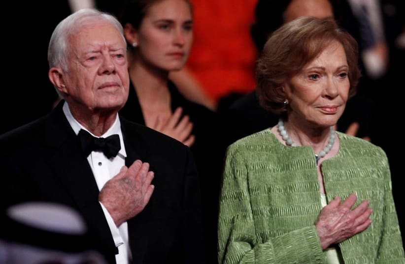  Former US President Jimmy Carter and his wife Rosalynn attend the "All Together Now - A Celebration of Service" at the John F. Kennedy Center for Performing Arts in Washington March 21, 2011. (photo credit: JIM YOUNG/REUTERS)