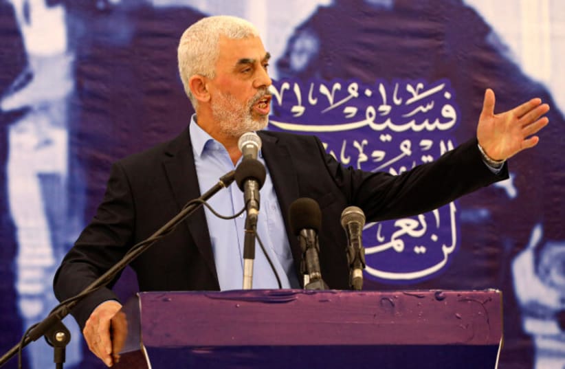  Yahya Sinwar leader of the Palestinian Hamas Islamist movement speaks during a meeting with members of the the Ezzedine al-Qassam Brigades, the armed wing of the Palestinian Hamas movement, in Gaza City, on April 30, 2022 (photo credit: ATTIA MUHAMMED/FLASH90)