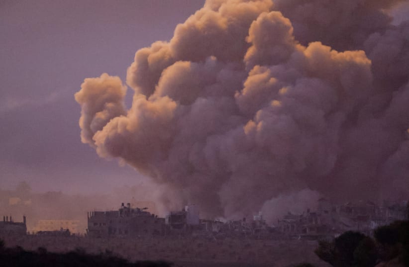  Smoke rises during an Israeli airstrike in Gaza, as seen from southern Israel, amid the ongoing conflict between Israel and the Palestinian group Hamas, November 22, 2023. (photo credit: REUTERS/ALEXANDER ERMOCHENKO)