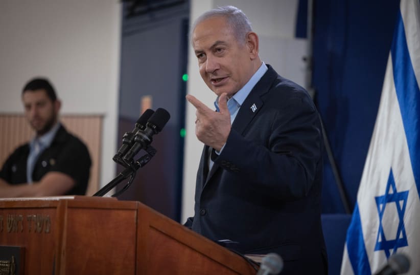  Prime Minister Benjamin Netanyahu attends a press conference at the Defense Ministry in Tel Aviv. November 22, 2023 (photo credit: CHAIM GOLDBEG/FLASH90)