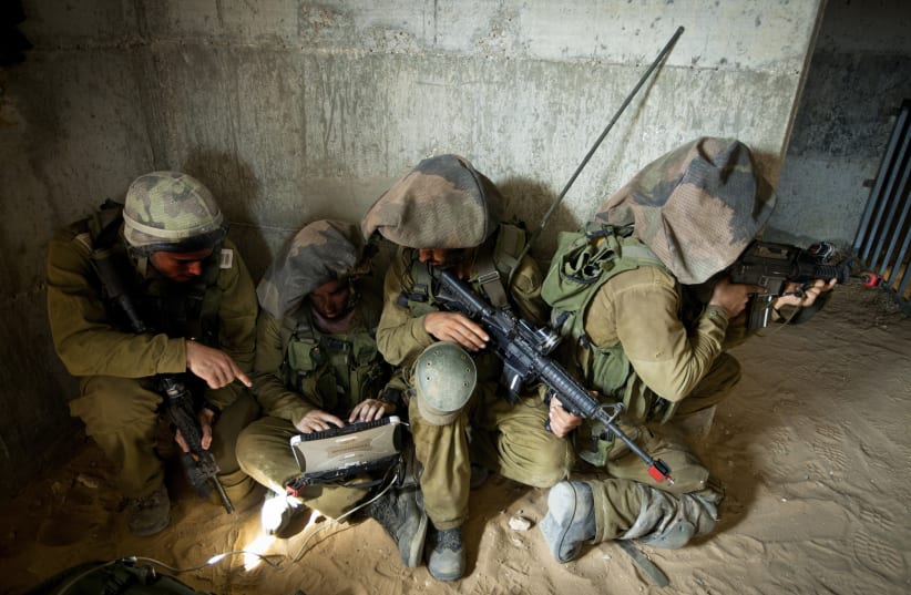  Soldiers of the operational Unit 8200 training in an undated photo. (photo credit: MOSHE SHAI/FLASH90)