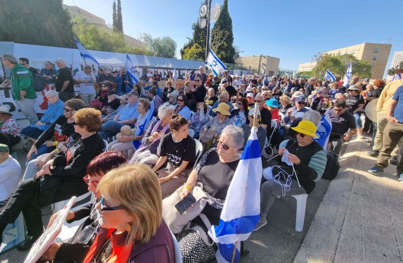  Kabalat Shabbat ceremony in front of the Knesset, where the families of the victims and hostages are camped.  (photo credit: Courtesy)