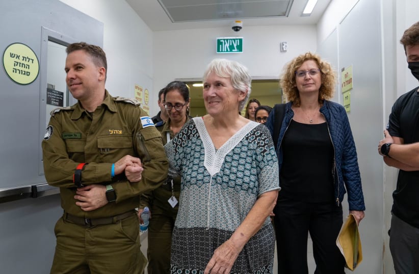  Hannah Katzir excitedly moves forward to reunite with family after being kidnapped by Hamas and falsely reported as dead by Palestinian Islamic Jihad. (photo credit: IDF SPOKESPERSON UNIT)