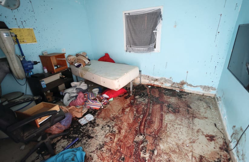  A BLOODSTAINED room in Kibbutz Nir Oz after the October 7 massacre carried out by Hamas: In the age of mass disinformation, the terrible truths of what occurred on October 7 must be repeatedly shared. (photo credit: RONEN ZVULUN/REUTERS)