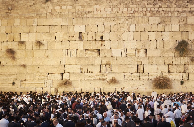  JEWS OF all stripes gather at the Kotel, the last remaining vestige of the Temples that stood in Jerusalem. (photo credit: BRUNO AGUIRRE/UNSPLASH)