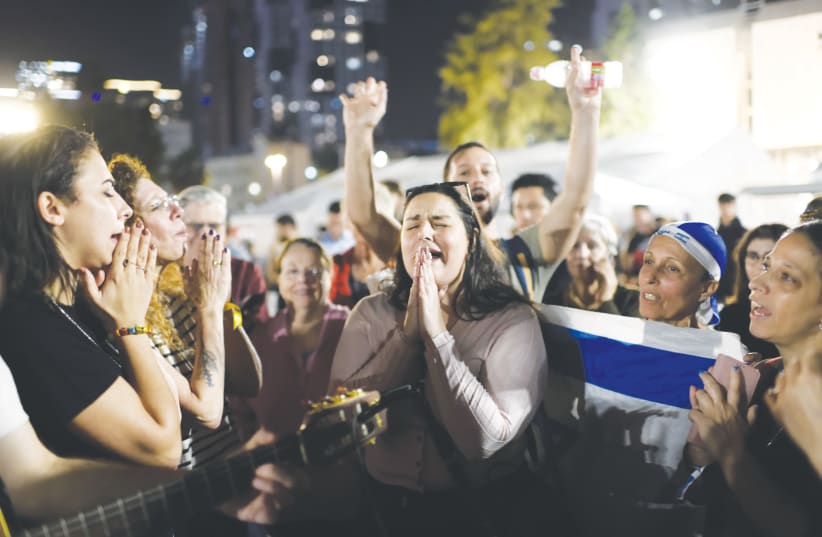 'Hostages Square' in Tel Aviv on Friday following the release of 13 hostages: With all the horror, tension, and uncertainty, we have displayed national unity at levels never seen before, says the writer. (photo credit: GILI YAARI/FLASH90)