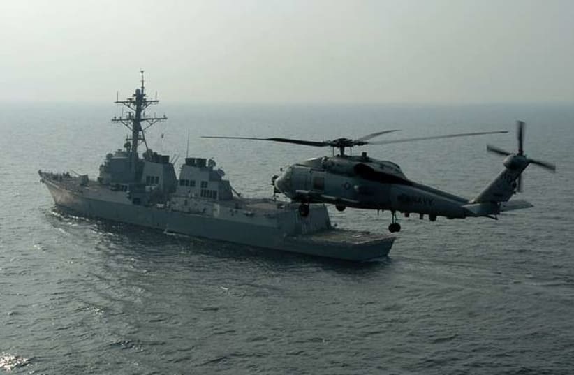  The guided missile destroyer USS Mason (DDG 87) and an SH-60B Seahawk (photo credit: US Navy/Photographer's Mate 2nd Class Peter J. Carney)