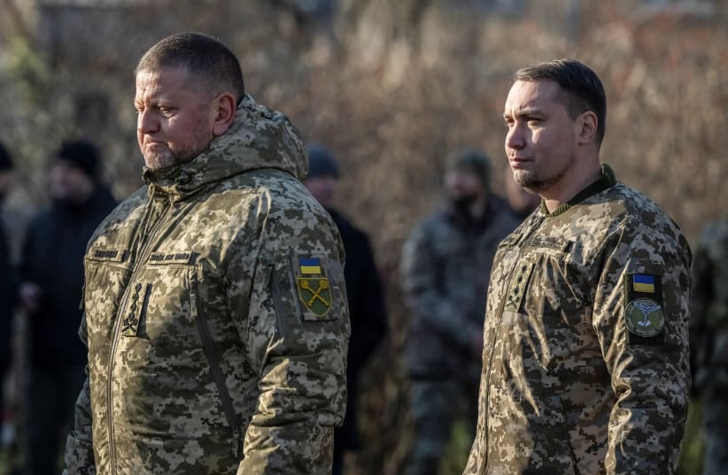  Chief of the Ukrainian Armed Forces Valerii Zaluzhnyi and Chief of the Military Intelligence of Ukraine Kyrylo Budanov visit a monument to Holodomor victims during a commemoration ceremony of the famine of 1932-33, in which millions died of hunger, in Kyiv, Ukraine November 25, 2023. (photo credit: REUTERS/Viacheslav Ratynskyi)