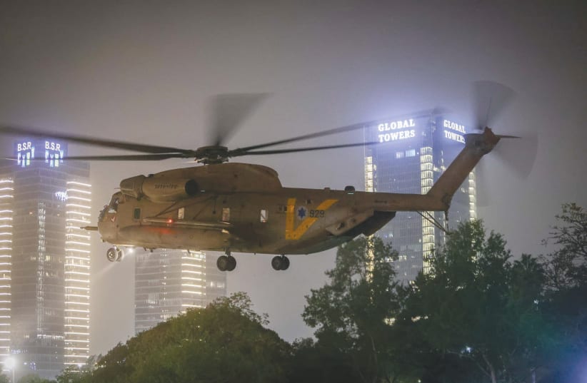  AN ISRAELI military helicopter with released Israeli hostages on board arrives at Schneider Children's Medical Center in Petah Tikva, on Sunday. (photo credit: YOSSI ALONI/FLASH90)