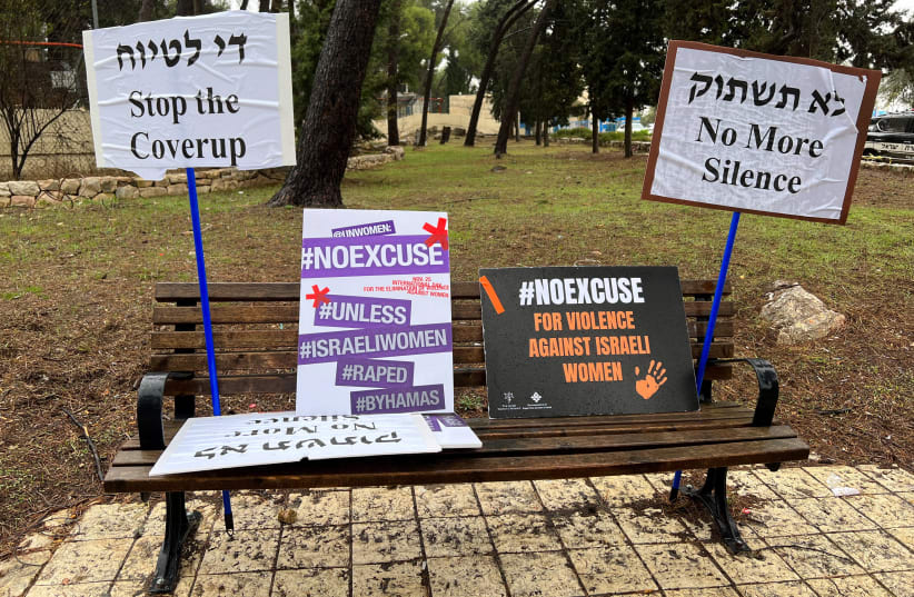  Signs against what protesters describe as international silence over sexual violence perpetrated against Israeli women during the attack by Palestinian Islamist group Hamas on southern Israel on October 7, are displayed on a bench at a protest in Jerusalem, November 27, 2023 (photo credit: REUTERS/DEDI HAYUN)