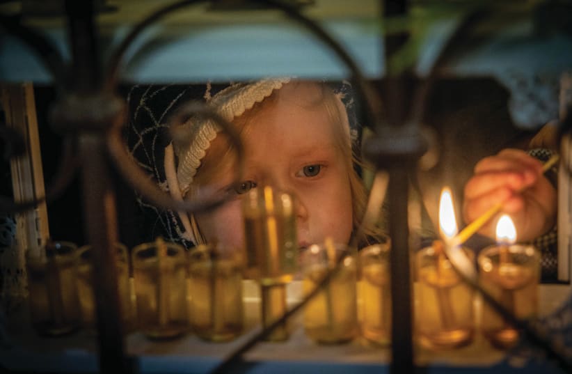  ‘IT WOULDN’T surprise me if some are wary of putting a menorah in their window.’ (photo credit: YONATAN SINDEL/FLASH90)