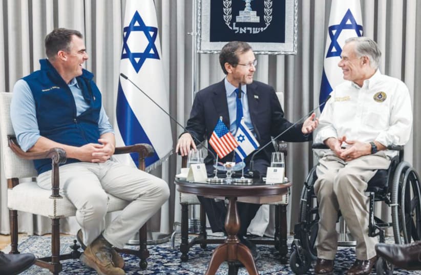  TEXAS GOVERNOR Greg Abbot (right) and Oklahoma Governor Kevin Sitt meet with President Issac Herzog during recent solidarity trip to Israel after the war broke out. (photo credit: OFFICE OF GOVERNOR ABBOTT)