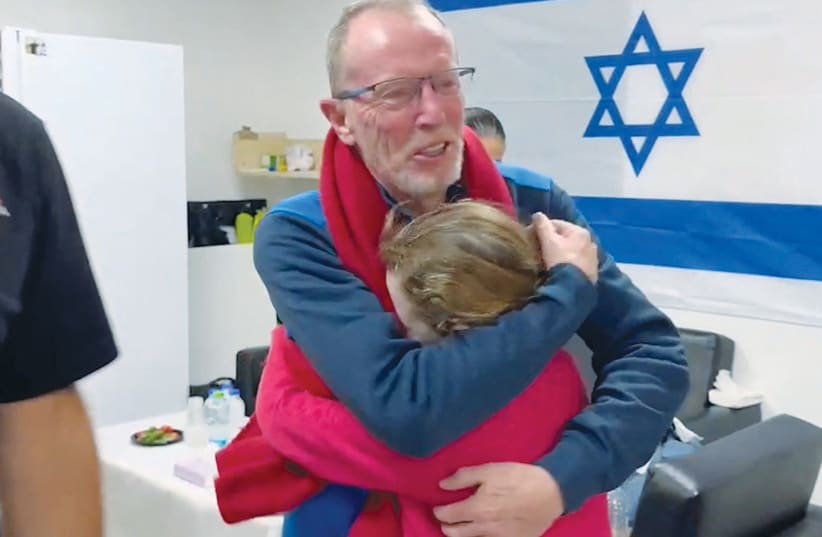 EMILY HAND, abducted by Hamas during the October 7 attack on Israel, is reunited with her father Thomas Hand after her release this week. (photo credit: IDF)