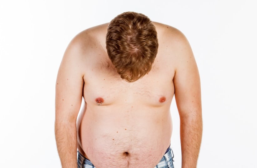 Breast growth in men - Why does it happen? (photo credit: INGIMAGE)