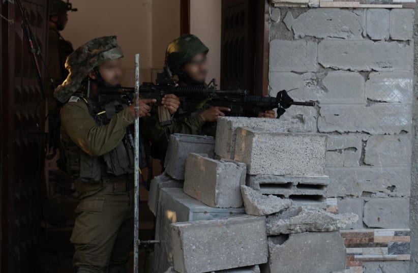  IDF troops operate in Jabalya, in the Gaza Strip. December 2, 2023. (photo credit: IDF)