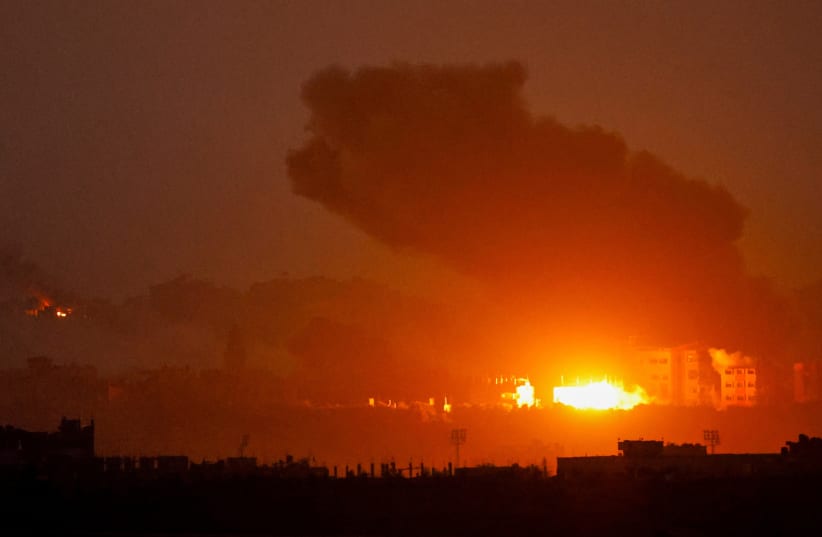 Smoke billows after an Israeli airstrike in Gaza, amid the ongoing conflict between Israel and the Palestinian terrorist group Hamas, as seen from southern Israel (illustrative), December 2, 2023. (photo credit: Alexander Ermochenko/Reuters)