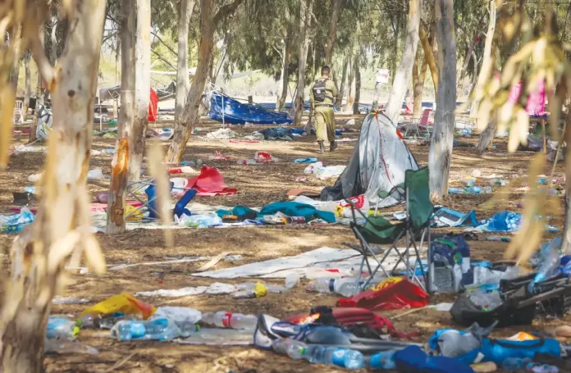 Terrorism can come in several forms, including sexual assault and rape motivated by nationalism. Pictured: The scene of Hamas's October 7 massacre at the Supernova music festival. (photo credit: YOSSI ZAMIR/FLASH90)
