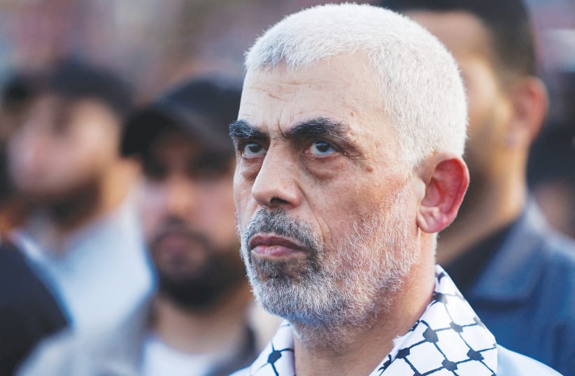  Hamas terrorist leader Yahya Sinwar attends a rally in Gaza City last year. a Hamas document published in 2017 does not replace its charter; it only offers a more pragmatic modus operandi to destroy Israel. (photo credit: MOHAMMED SALEM/REUTERS)