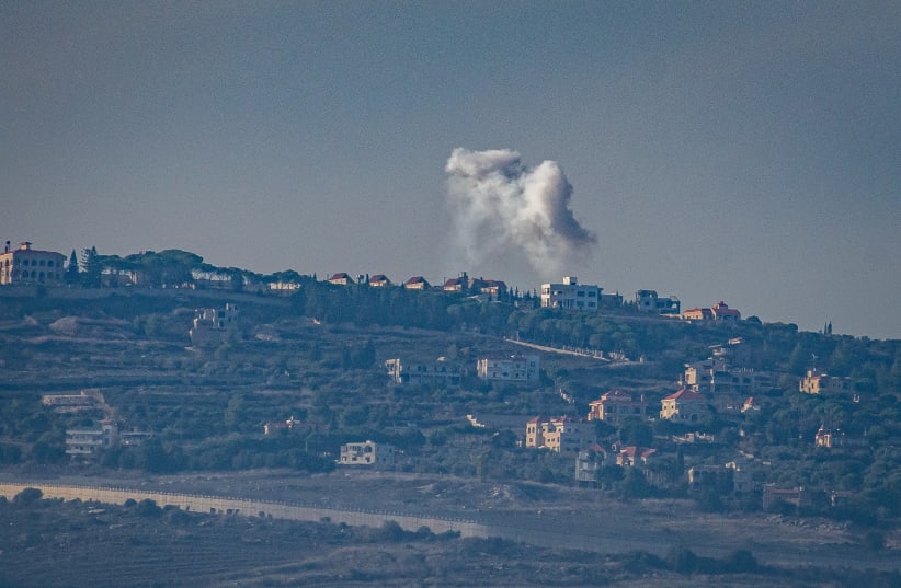  Smoke rises during an exchange of fire between the IDF and terrorists from the Hezbollah organization on the border between Israel and Lebanon, December 3, 2023. (photo credit: AYAL MARGOLIN/FLASH90)