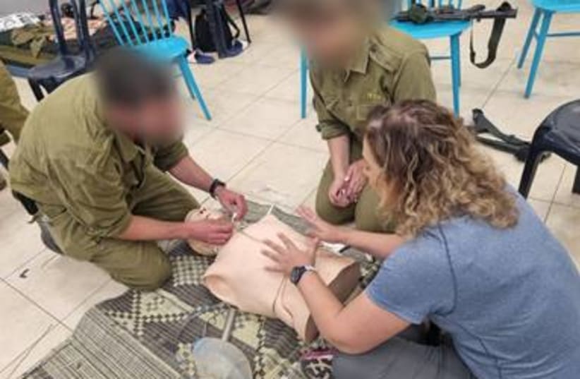  Triage teams engaged in emergency simulations with IDF soldiers (photo credit: RAMBAM HEALTH CARE CAMPUS)