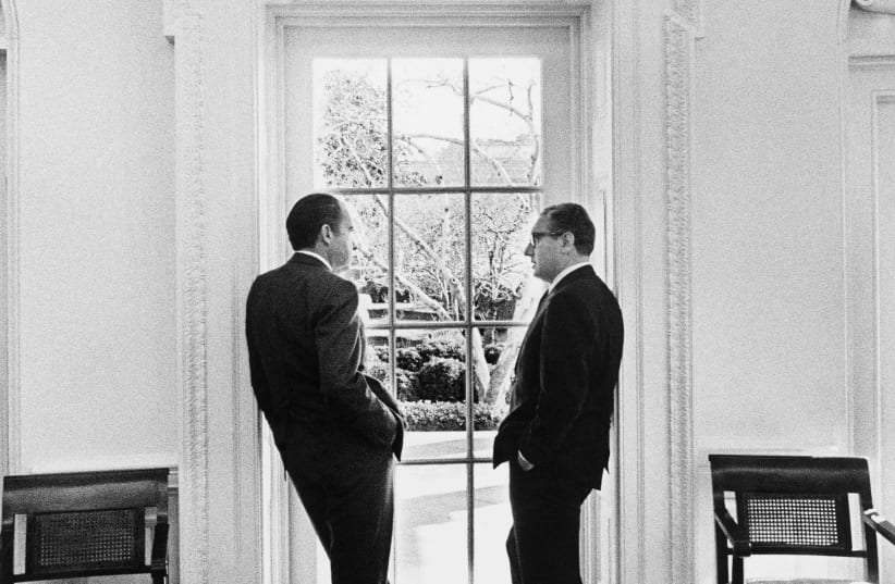  NATIONAL SECURITY adviser Henry Kissinger (R) and US president Richard Nixon converse in the White House’s Oval Office, 1971.  (photo credit: Richard Nixon Presidential Library/Handout via Reuters)