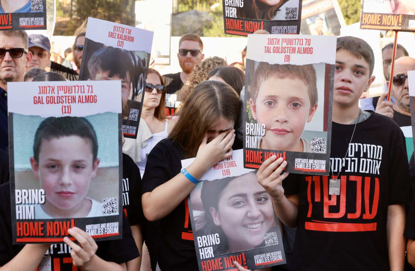  WATCH FOR unusual patterns in their children. Families hostages demonstrate in front of the Knesset. (photo credit: MARC ISRAEL SELLEM/THE JERUSALEM POST)