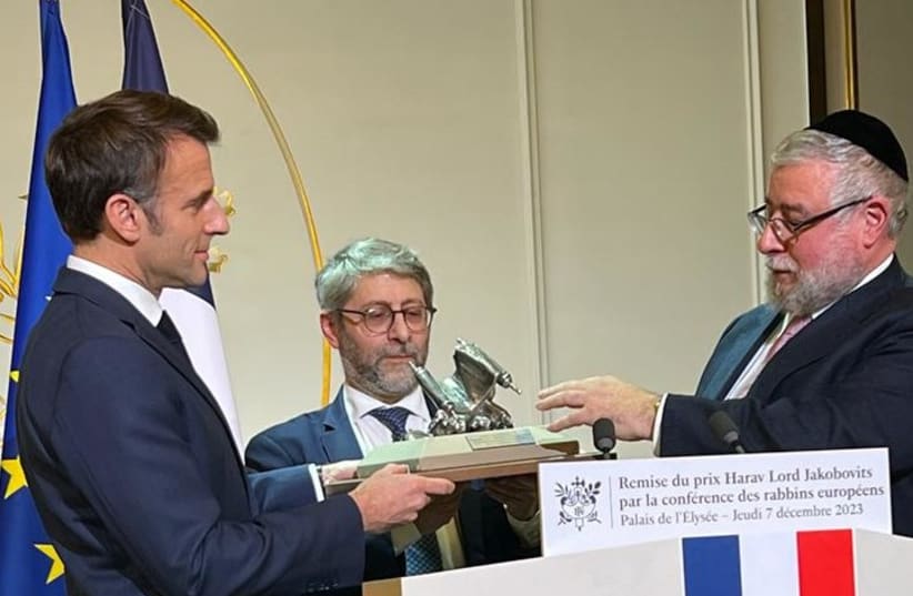  Macron receives a Jewish community advocacy award. (photo credit: CONFERENCE OF EUROPEAN RABBIS)