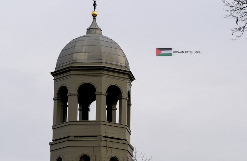  Students fly an aerial banner that reads "Harvard hates Jews" over the campus at Harvard University in Cambridge, Massachusetts, US, December 7 (photo credit: REUTERS/FAITH NINIVAGI)