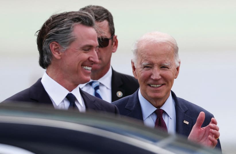  US PRESIDENT Joe Biden is greeted by California Governor Gavin Newsom at San Francisco International Airport last month. The writer accuses Newsom of ‘pathetic cowardice’ in handling antisemitism.  (photo credit: Brittany Hosea-Small/Reuters)