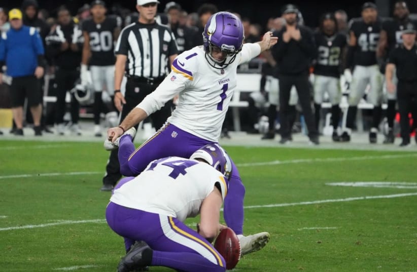  Minnesota Vikings place kicker Greg Joseph (1) kicks a 36-yard field goal out of the hold of punter Ryan Wright (14) in the fourth quarter against the Las Vegas Raiders at Allegiant Stadium (photo credit: KIRBY LEE/USA TODAY/VIA REUTERS)
