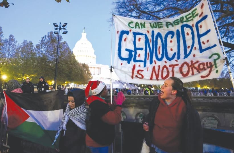  PALESTINIAN SUPPORTERS protest outside the US Capitol last month. (photo credit: Elizabeth Frantz/Reuters)