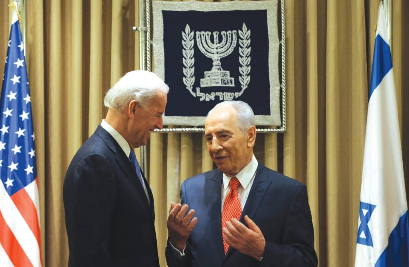  THEN-PRESIDENT Shimon Peres meets with then-US vice president Joe Biden in Jerusalem, 2010. In a 2006 conversation, Peres said to Biden: ‘What does Hamas have to do with victory?’  (photo credit: Yin Bogu/Reuters)