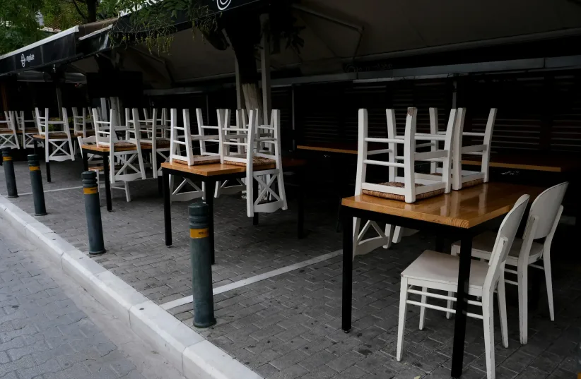  Illustrative image of a cafe being closed. Israel's hospitality and food industry was hit the hardest by the economic damages of the ongoing war with Hamas. (photo credit: SHUTTERSTOCK)