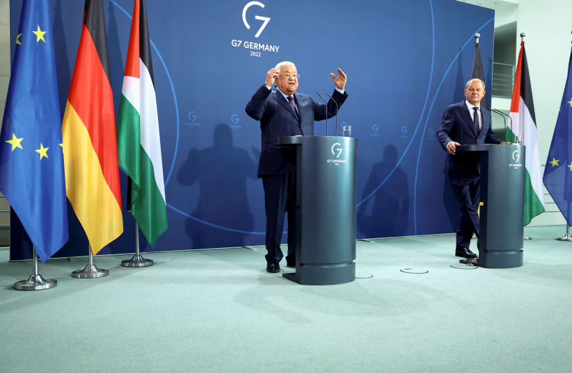  German Chancellor Olaf Scholz and Palestinian President Mahmoud Abbas attend a news conference, in Berlin, Germany, August 16, 2022. (photo credit: REUTERS/LISI NIESNER)