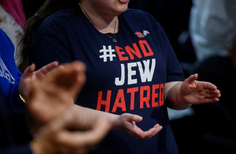   An attendee applauds at some level of a official-Israel rally on the Soloway Jewish Neighborhood Centre in Ottawa, Ontario, Canada October 9, 2023. (portray credit: REUTERS/BLAIR GABLE)
