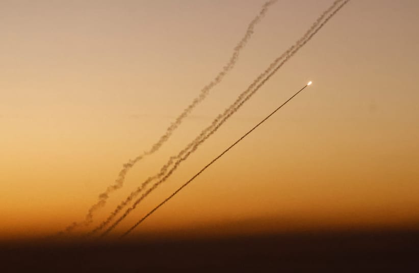  A rocket fired from Gaza heads towards Israel, at the Israeli-Gaza border, amid the ongoing conflict between Israel and the Palestinian Islamist group Hamas, as seen from Southern Israel, December 15, 2023.  (photo credit: CLODAGH KILCOYNE/REUTERS)