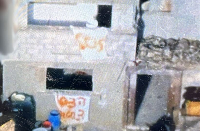  Signs with 'SOS,' and 'help,' seen in the Gaza building where three Israeli hostages were killed on December 15, 2023 (photo credit: IDF SPOKESPERSON'S UNIT)